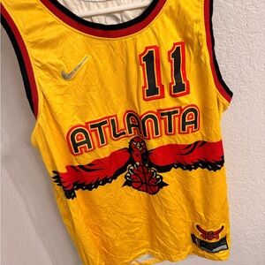 Nike Yellow Jersey with Red Hawk Design